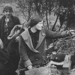 Civilians Liberated by the British Looking at a German Machine Gun Nest near their Home