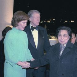 Rosalynn Carter and Jimmy Carter greet Madame Zhuo Lin and Deng Xiaoping at the White House for a state dinner in honor of the Vice Premier of China