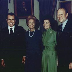 Photograph of President Richard M. Nixon and First Lady Pat Nixon with Representative Gerald R. Ford and Betty Ford in the Blue Room of the White House, Following the Nomination of Gerald Ford as Vice