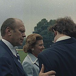 Vice President Ford consoling David Eisenhower as Nixon departs from the White House