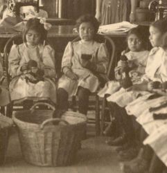 Young school girls attending sewing class at Albuquerque Indian School