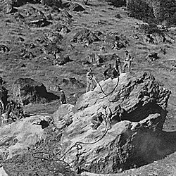 CCC Camp BR-88, 89 and 90, Deschutes Project, Oregon: CCC enrollees drilling large rocks near Smith Rock, Deschutes Project, Oregon.