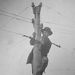 Cutting telegraph wire and connecting the ends, so that the point at which the connection is broken cannot be seen from the ground