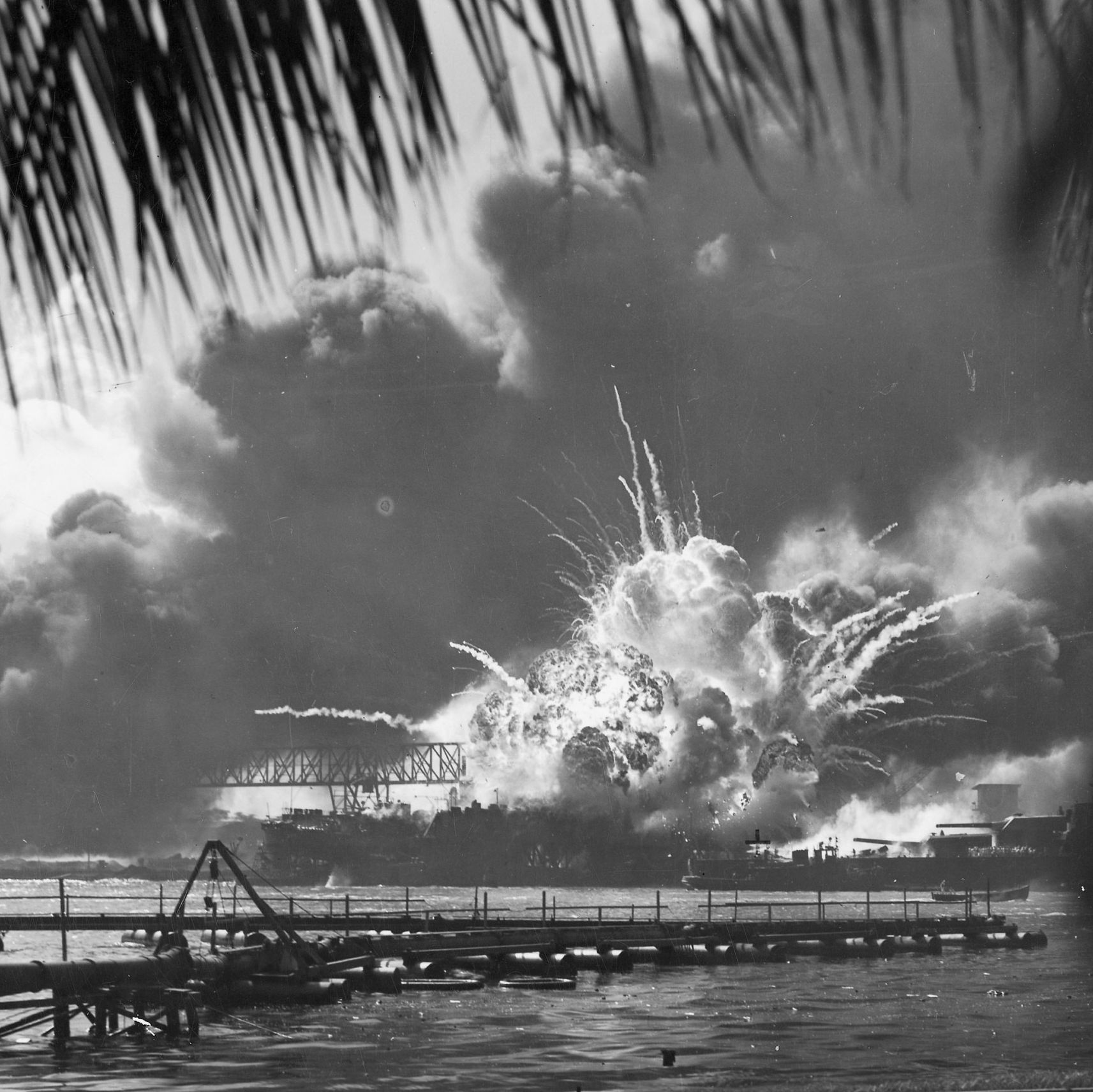 USS SHAW exploding during the Japanese raid on Pearl Harbor, T.H.