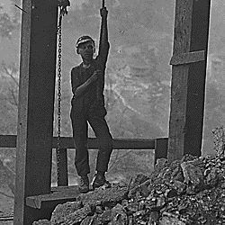 Welch Mining Co., Welch, W. Va. Boy running "trip rope" at tipple. Overgrown, but looked 13 years old. Works 10 hours a day. Welch, W. Va.