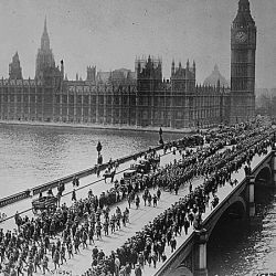 American troops on way to the front march thru London amid the plaudits of the multitudes, crossing Westminster Bridge.