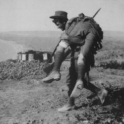 An Australian Bringing in a Wounded Comrade to Hospital