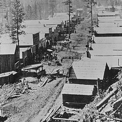"Deadwood in 1876." General view of the Dakota Territory gold rush town from a hillside above. By S. J. Morrow