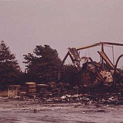 Twisted girders remain at the rear of a chemical storage building of the Pennwalt Corporation, after a June 20, 1974, fire and explosion