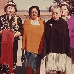 Four Women of the Iowa Indian Tribe are Shown Wearing a Modern Version of Their Costumes