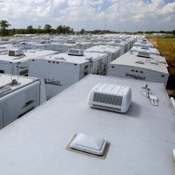 [Hurricane Katrina/Hurricane Rita] Baton Rouge, LA, October 1, 2005 -- A sea of white travel trailer tops stretches out into the horizon at a staging area set up to hold these temporary housing units 