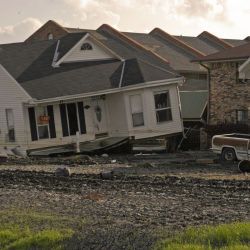[Hurricane Katrina] New Orleans, LA, 9-30-05 -- Houses were destroyed after hurricane Katrina came through the area and the levees broke. Some homes floated off their foundations and bumped into other