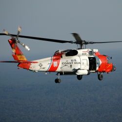 [Hurricane Katrina] Gulf Coast of Mississippi, September 30, 2005 -- A US Coast Guard helicopter continues to carry out missions and assignments after hurricane Katrina swept through the area. The coa