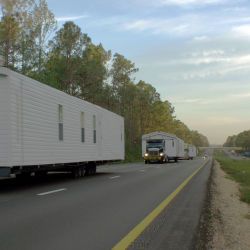 [Hurricane Katrina] Purvis, MS. October 8, 2005 - A convoy of FEMA trailers traveling South on MS interstate 59 on its way to southern Mississippi. Nicolas Britto/FEMA