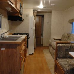 [Hurricane Katrina] Gautier, Miss., November 10, 2005 -- The living, dining and kitchen areas of a FEMA travel trailer. FEMA is providing travel trailers to residents of Mississippi displaced by Hurri