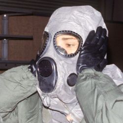 AIRMAN test biological-chemical warfare gear during a training exercise