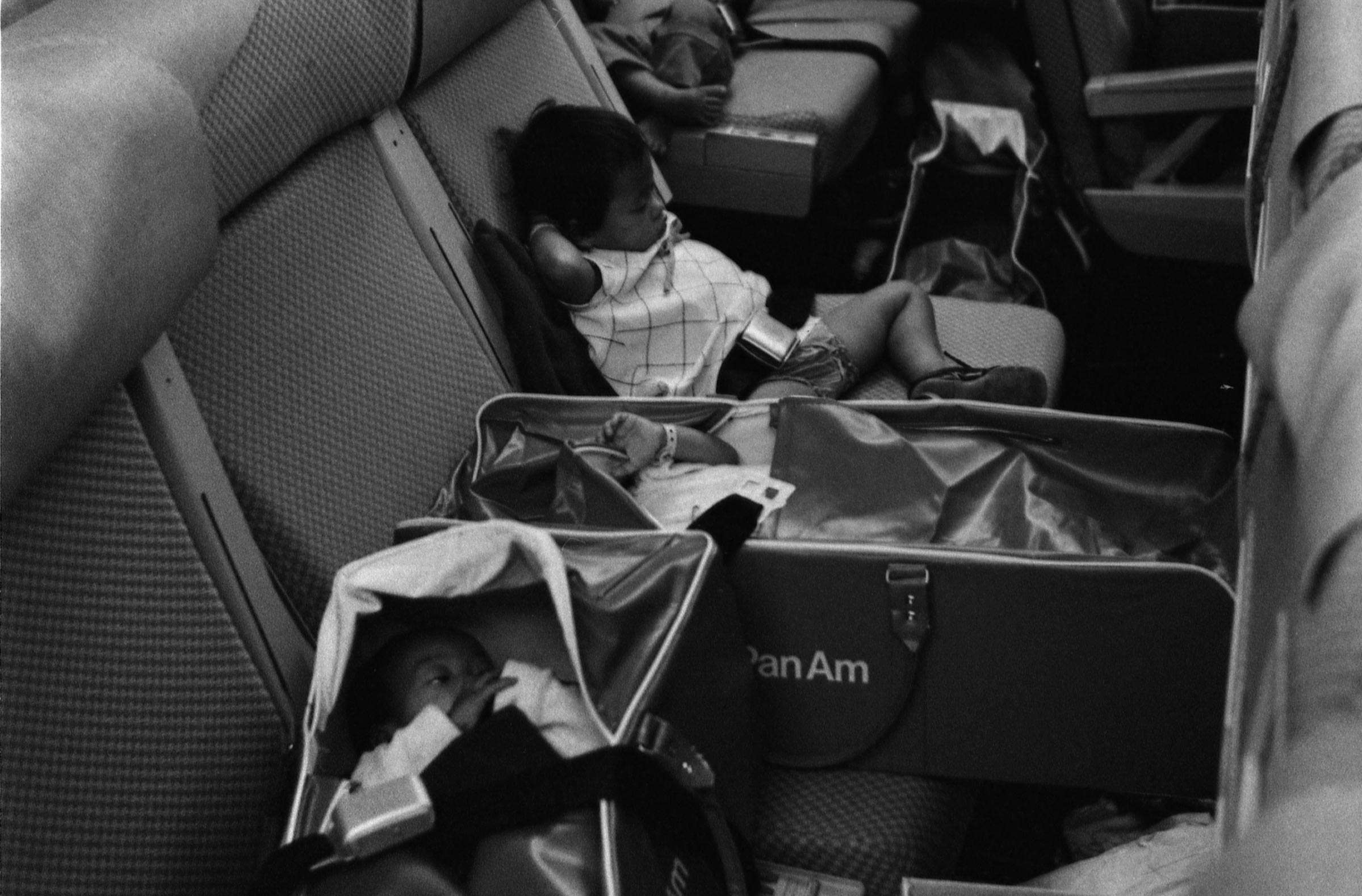 Vietnamese Refugee Children on a Flight to San Francisco