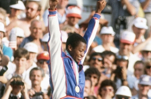 Alonzo Babers Displays His Gold Medal at the 1984 Summer Olympics