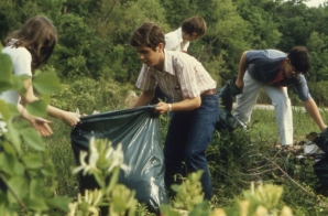 Young People Filling Bags with Litter
