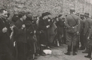 SS Men Searching and Interrogating Jewish Civilians, Warsaw, Poland