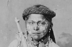 Apache boy with face and legs painted