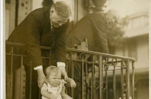 Herbert Hoover Greets a Child as He Returns to California