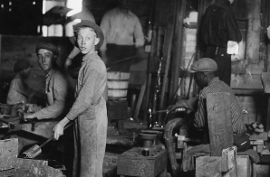 Cumberland Glass Works. A young holding mold boy is seen, dimly, in middle distance to left of centre. Bridgeton, N.J.