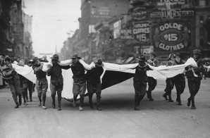 Catching Contributions in Flag during Red Cross Parade, Detroit, Mich.