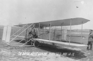 Orville Wright Sitting in the Original Wright Plane