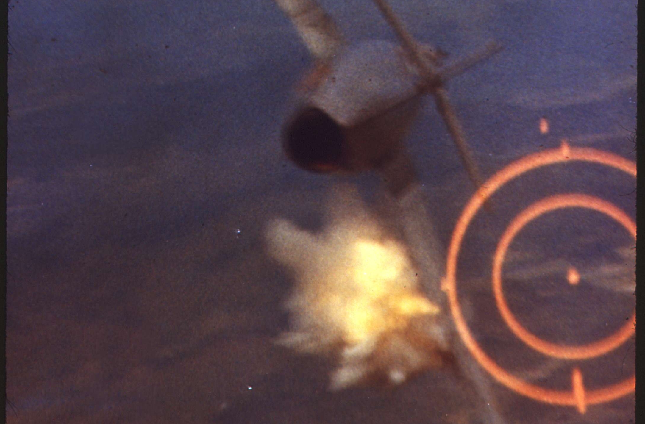 Major Kuster Hits the MIG Near the Fuselage and it Bursts into Flames