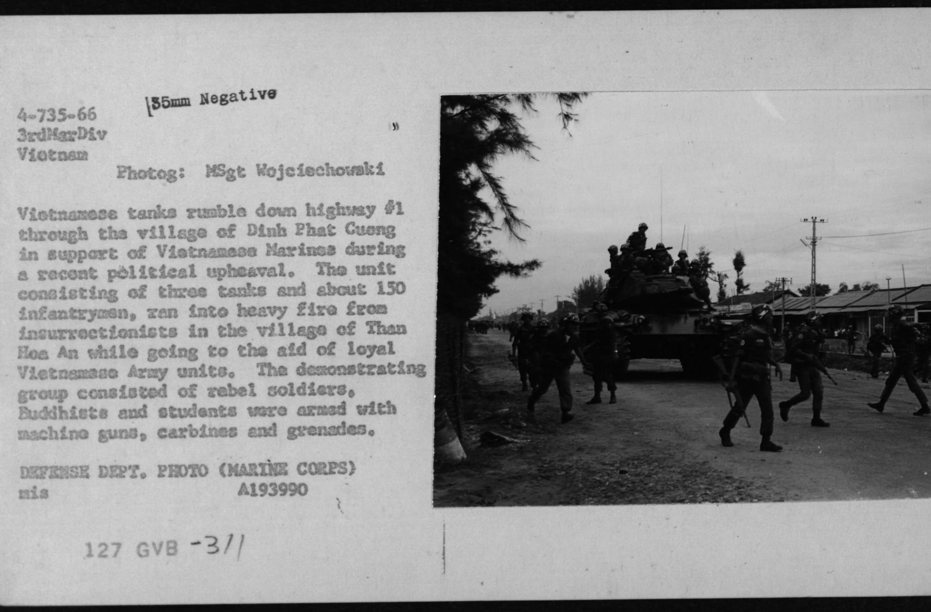 Vietnamese Tanks Rumble Through the Village of Dinh Phat Cuong