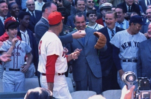 President Nixon throwing out the first ball on opening day of the 1969 baseball season between the Washington Senators and the New York Yankees