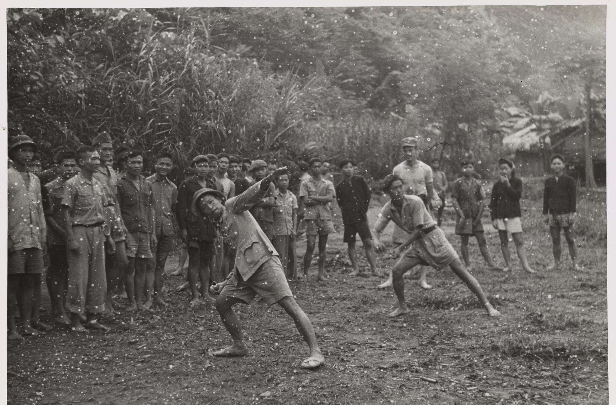 OSS Officers Watch as Viet Minh Practice Throwing Grenades