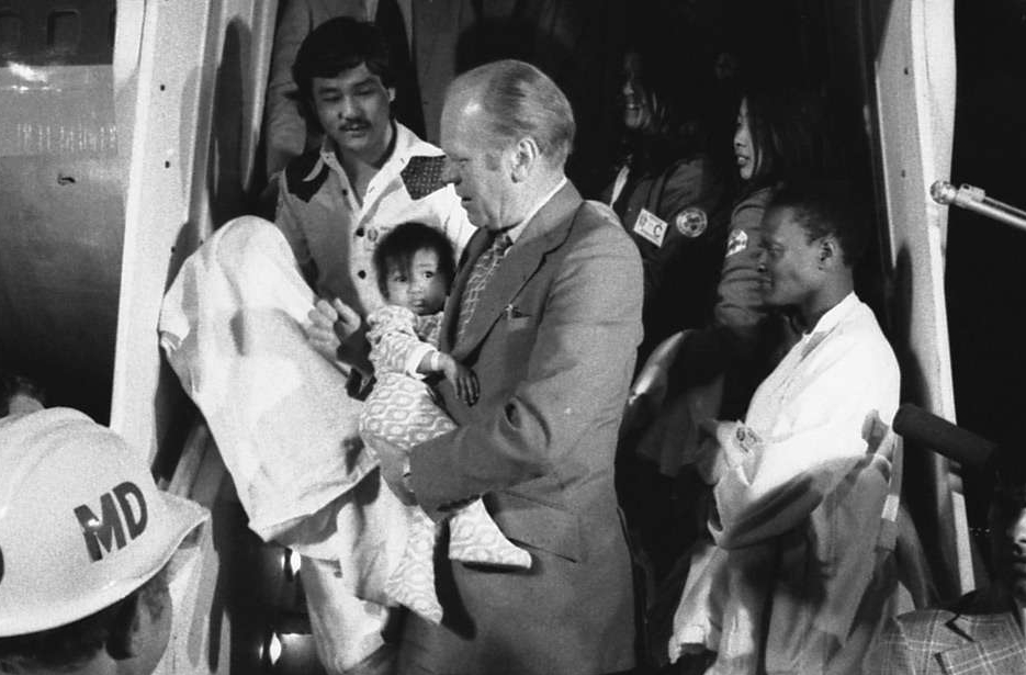 President Gerald R. Ford Carrying a Vietnamese Baby from "Clipper 1742"