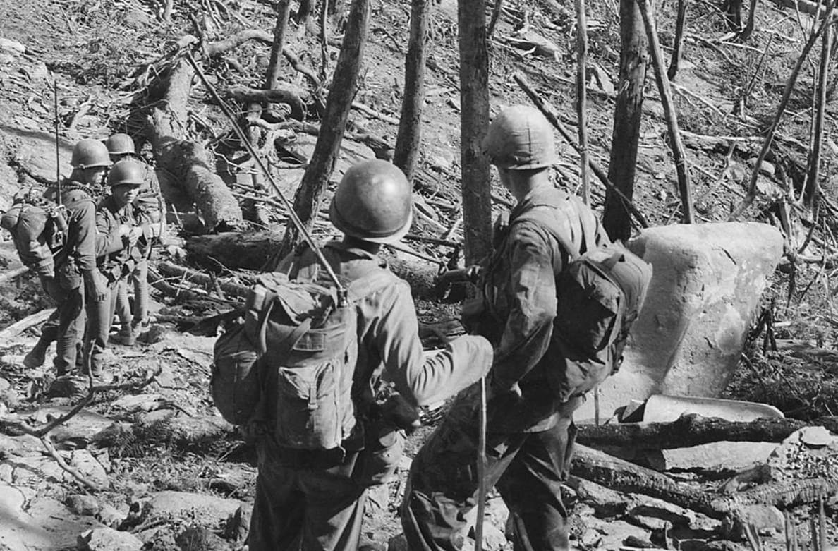 Vietnam.... Members of the 1st ARVN Division move along a trail during ...