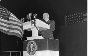 President Harry S. Truman (behind podium)addresses the crowd at the Fourth of July ceremonies commemorating the 175th anniversary of the Declaration of Independence.