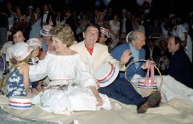 7/4/1981 President Reagan Nancy Reagan Earle Jorgensen Caroline Deaver Mike Deaver watching fireworks at July 4th Independence Day Picnic on South Lawn